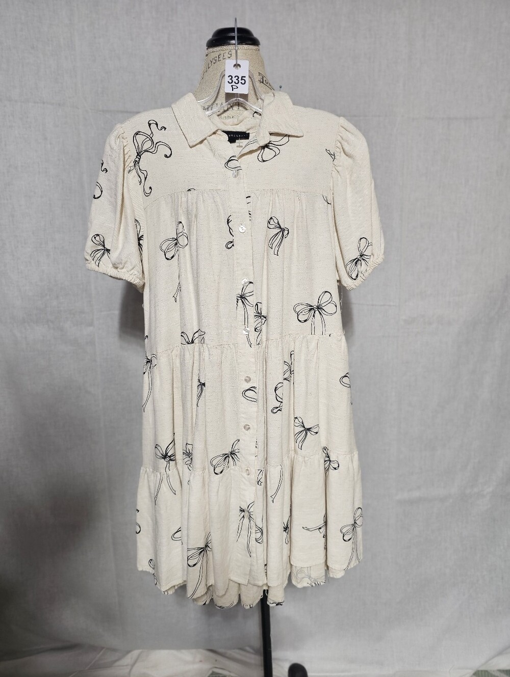 Jane and Delancey Cream Tiered Button-Front Dress with Black Bow Print